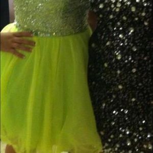 Lime green sweet heart neck line dress.